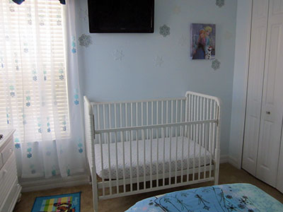 Cot located in Bedroom #5